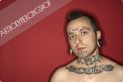 Piercing man tattoo