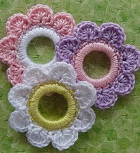 http://www.ravelry.com/patterns/library/flower-ring-decoration