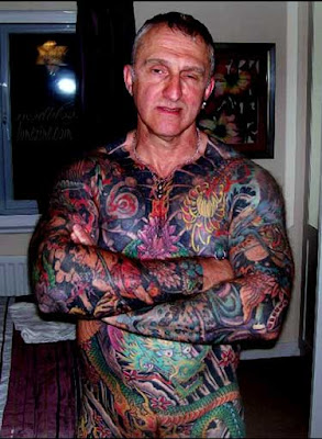 Strange Tattoos and Ugly body modifications Seen On coolpicturesgallery.blogspot.com