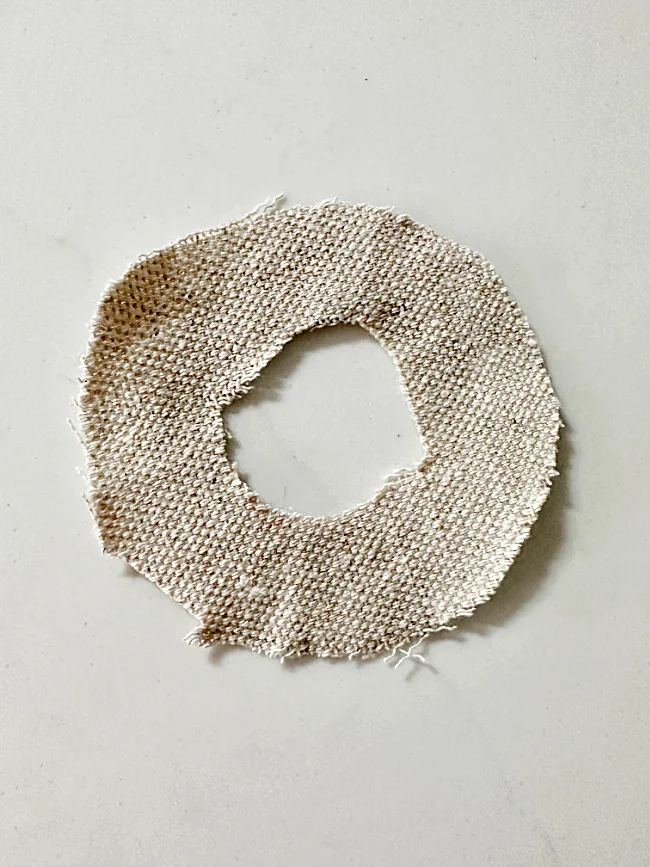 circle of fabric with hole