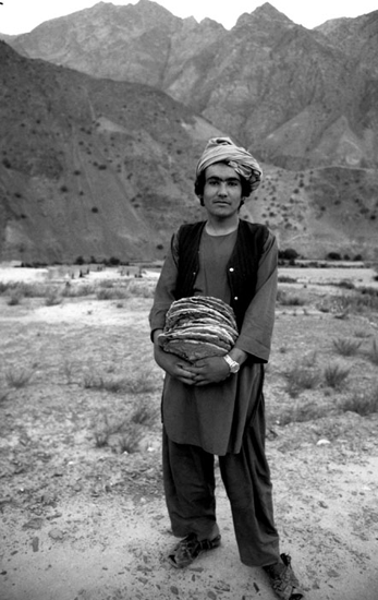 Boy carrying naan