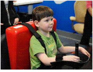 boy in robotic chair