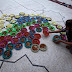 A man arranges food plates for Iftar at a mosque in Peshawar