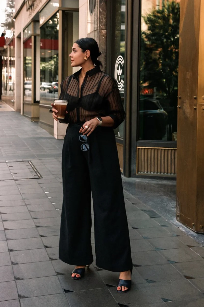 woman in a stylish total black look