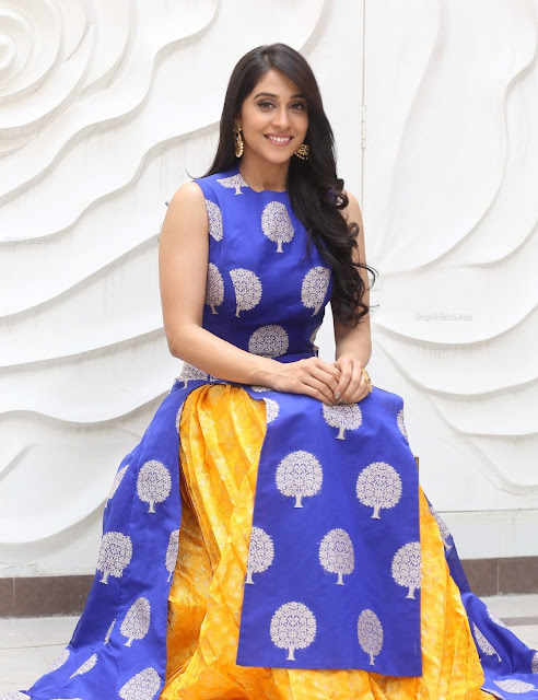  Regina Cassandra in Yellow Silk Lehenga with Contrast Blue Sleeveless Long Kurti At Shaurya Promotions