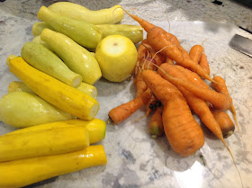 whole yellow squash and carrots