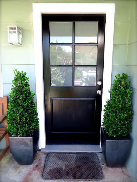 black front door Nbaynadamas boxwood topiary topiaries plants modern pots planters wire doormat