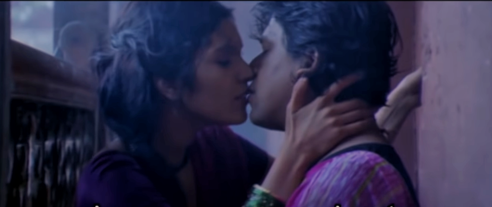 kissing scene between Mukta Barve and Upendra Limaye from the marathi movie Jogwa