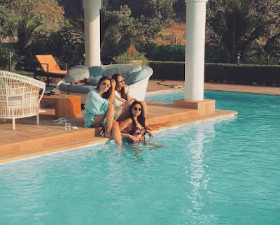 Alia Bhatt sitting her two friends by the pool in blue shrug over bikini