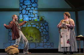 IN PERFORMANCE: baritone SCOTT MACLEOD as Peter (left) and soprano LYNDSEY SWANN as Gertrud (right) in Greensboro Opera's March 2019 production of Engelbert Humperdinck's HÄNSEL UND GRETEL [Photograph © by VanderVeen Photographers]