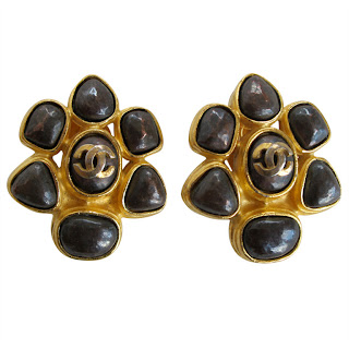 Vintage 1990's brown and gold stone flower Chanel earrings with "CC" logo in the center.