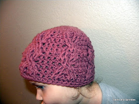 Swirls and Sprinkles: With a Twist Hat by Hooked in Yarn, hat made by Swirls and Sprinkles