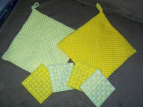 https://www.zibbet.com/marsha32/hot-pad-and-coaster-set-in-yellows