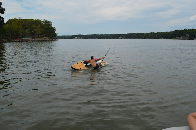 Josh falling off of the paddleboard