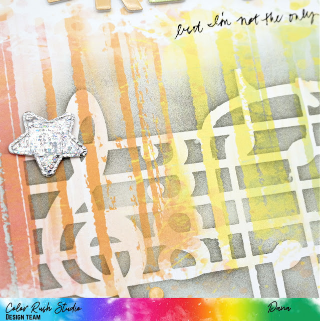 Dreamer John Lennon inspired rainbow and masked music note scrapbook layout with sequin-filled star shaker and foiled fabric star embellishments.