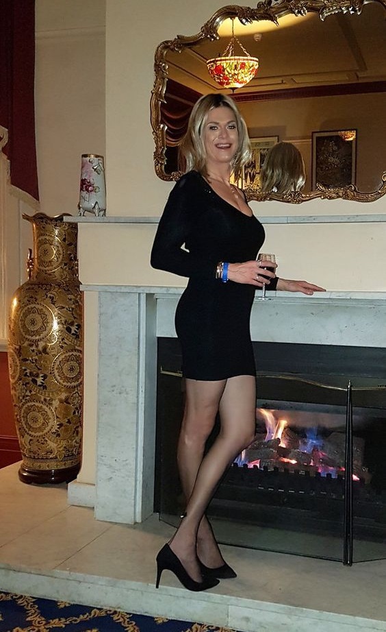 Mature crossdresser in black pantyhose