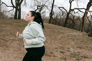 Photo by Andres  Ayrton: https://www.pexels.com/photo/a-sportswoman-jogging-in-a-park-6551485/