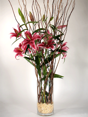 Twisted Willow Branches and Lilies For this display we placed a smaller