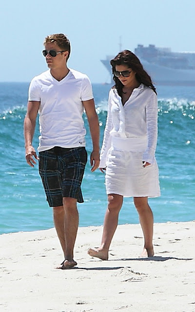 Cheryl Cole and Derek Hough taking a stroll along the beach in South Africa