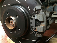 BMW E92 335i rear brake caliper close up