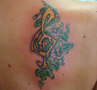 Floral Music Notes Tattoo