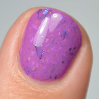 purple nail polish with flakies