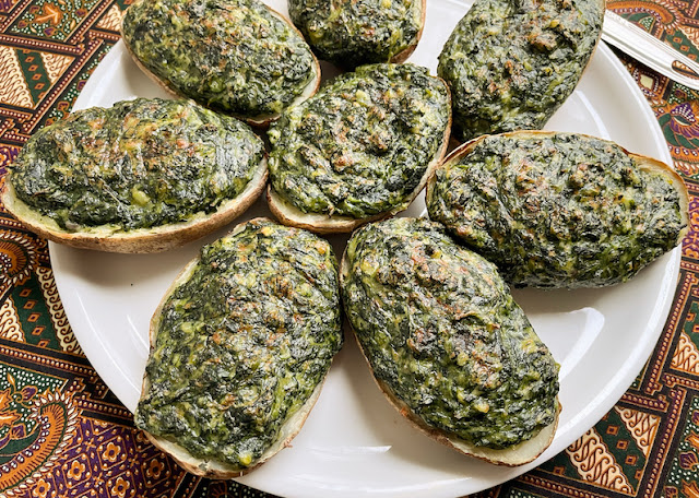 Food Lust People Love: A favorite in southern Louisiana, spinach Madeline is a cheesy casserole or one-pan side dish. For this version, I used it as a filling to make spinach Madeline stuffed potatoes. Y'all, it's so good!