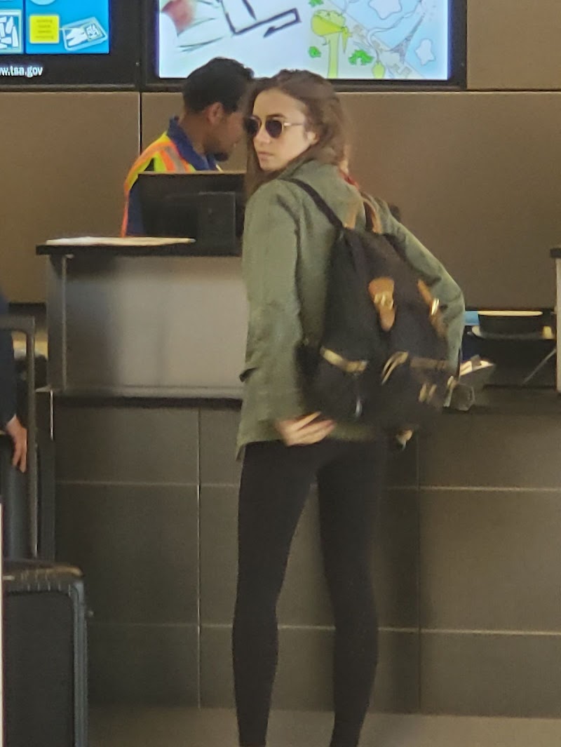 Lily Collins Clciks at Los Angeles International Airport 3 Aug-2019