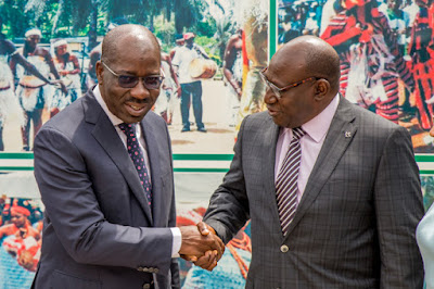 Mr. Babatunde Savage, Chairman,Guinness Nig. Plc, and Edo State Governor Godwin Obaseki exchanging pleasantries