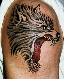 strength wolf tattoos