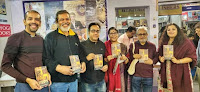 Rajat Chaudhuri with readers at a book signing