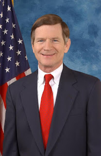This picture comes from here: http://lamarsmith.house.gov/about/biography. I didn't photoshop any emotions onto it!