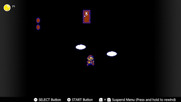 NES-NSO screen shot of Super Mario Bros. 2. It is black except for a door hovering in space, Mario and two clouds.