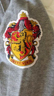 Sleeve of the Gryffindor sweatshirt