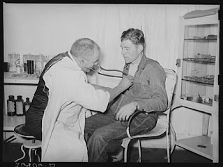 Dr. Springs examining patient