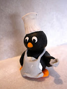 A friend of mine wanted penguin center pieces at her reception. (fimo chef penguin)