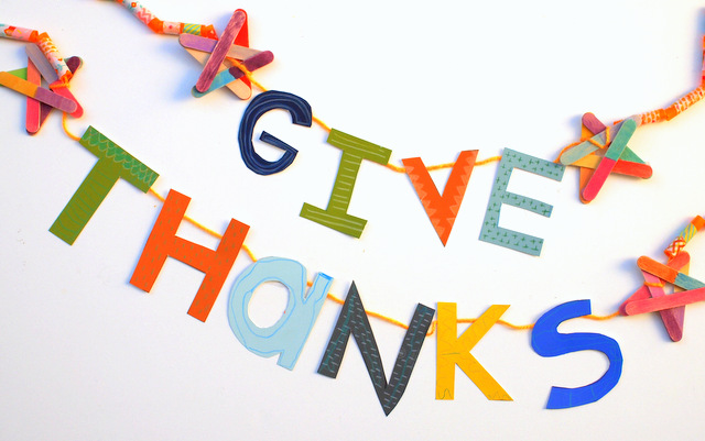 Give Thanks Thanksgiving Banner made from straws, washi tape, paint chips, popsicle sticks, yarn, and colored pencil