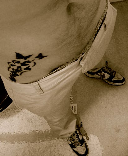 bow tattoos on hip