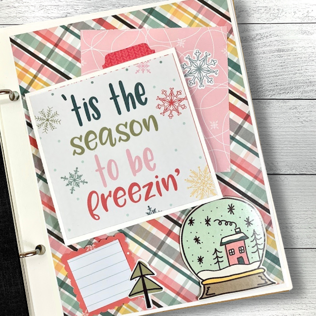 Freezin' Season winter scrapbook album page with a snowglobe & plaid paper