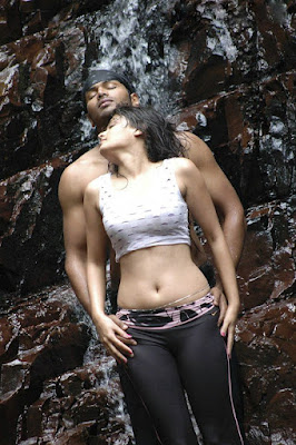 Indian actress Sneha Ullals wet pants get sticked to her body and expose hot thighs and sexy back