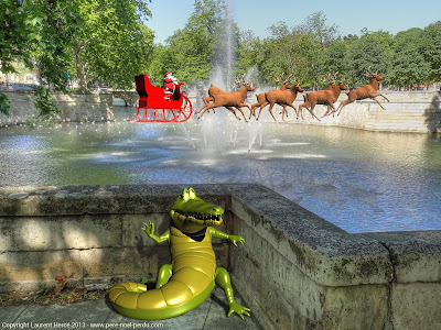 Le Père Noël survole les jardins de la fontaine à Nîmes