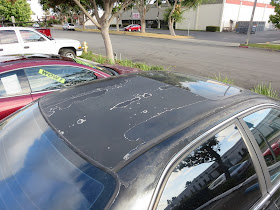 Delaminating (peeling) paint on before complete car paint job.
