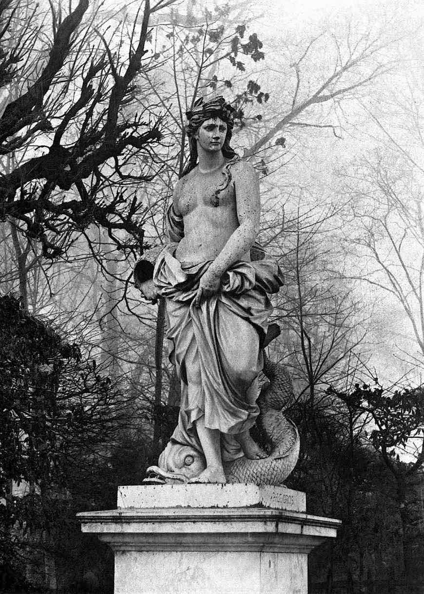 a clear old photograph of a Versailles palace statue