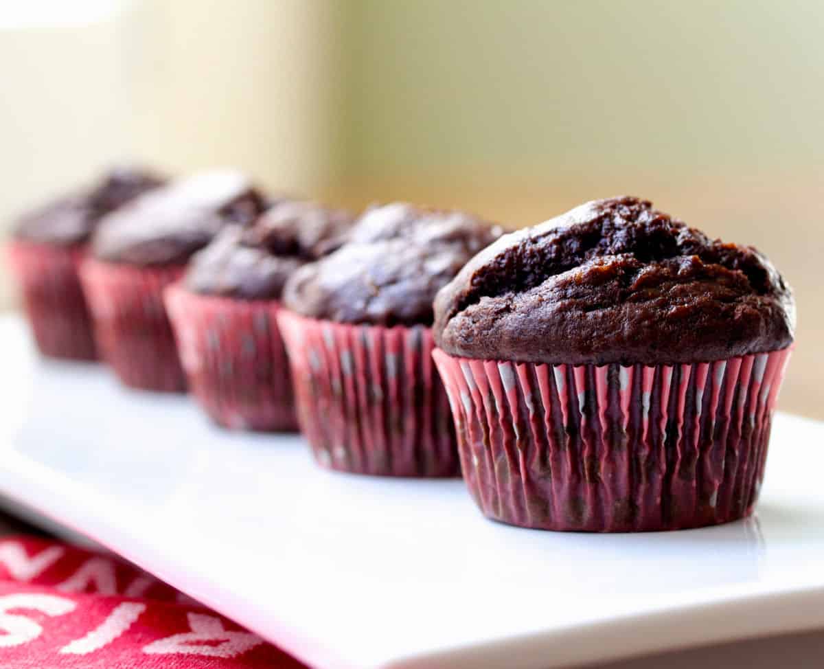 four Double Chocolate Chip Banana Muffins in a row.