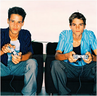 image of young men playing video game