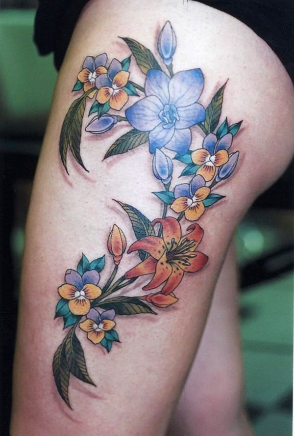 flowers tattoo in thigh and anchor ship tattoos