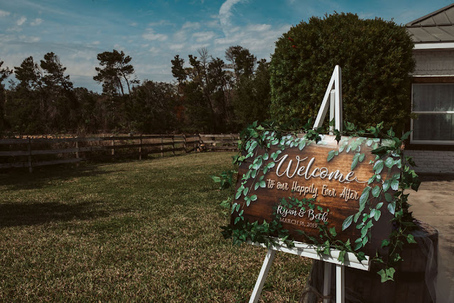 Wooden welcome sign at Bella Ranch