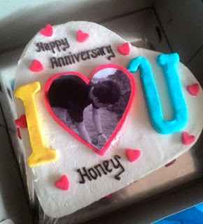 contoh cake anniversary pakai logo