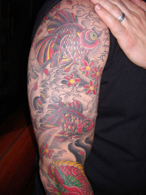 koi japanese tattoo on sleeve Koi Japanese Tattoo lotus tattoo design