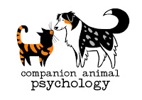 Happy cats, happy dogs, thanks to science. About Companion Animal Psychology blog; logo is pictured.